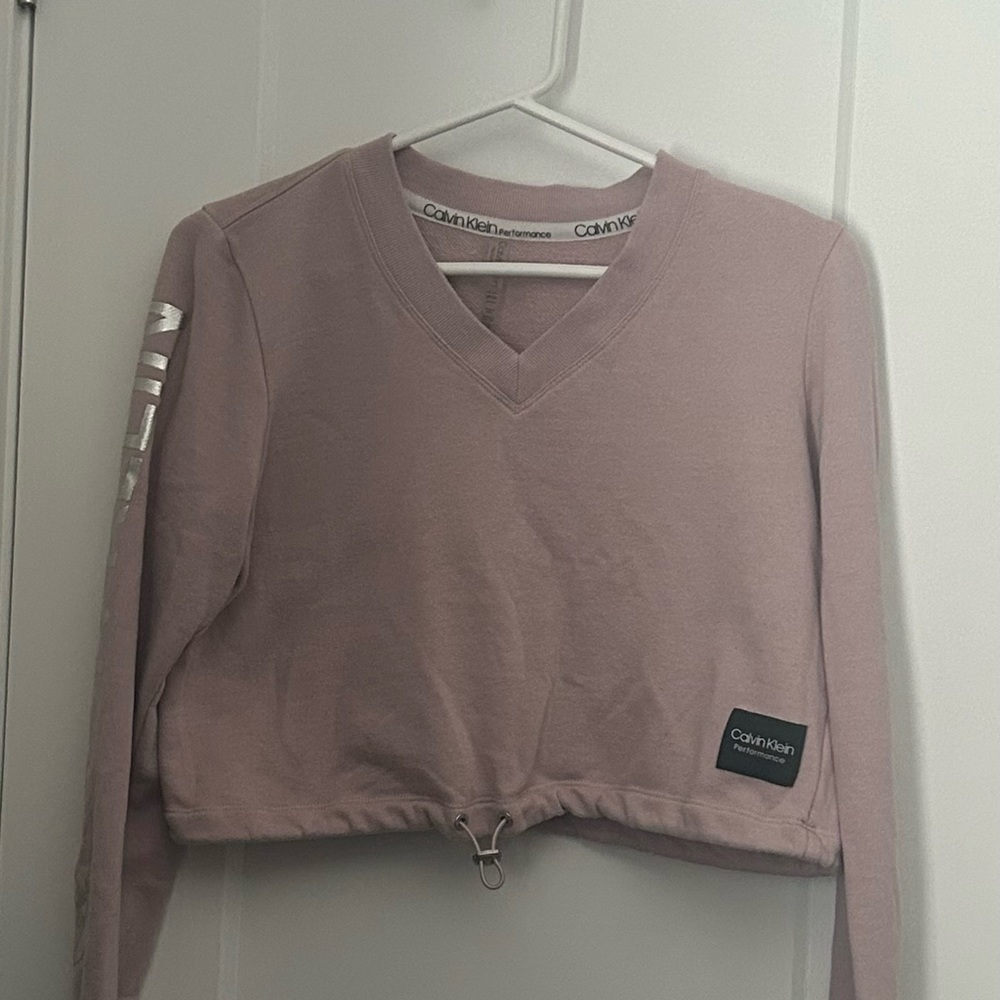 Calvin Klein cropped performance sweatshirt.